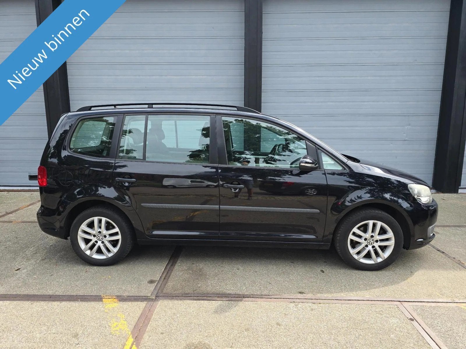 Volkswagen Touran 1.2 TSI 7 persoons, Auto's, Euro 5, Gebruikt, Zwart, 4 cilinders
