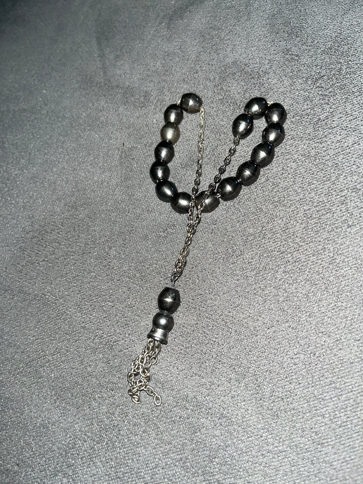 Zwarte kralenarmband met zilverkleurige ketting, Overige materialen, Gebruikt, Zwart, Ophalen of Verzenden