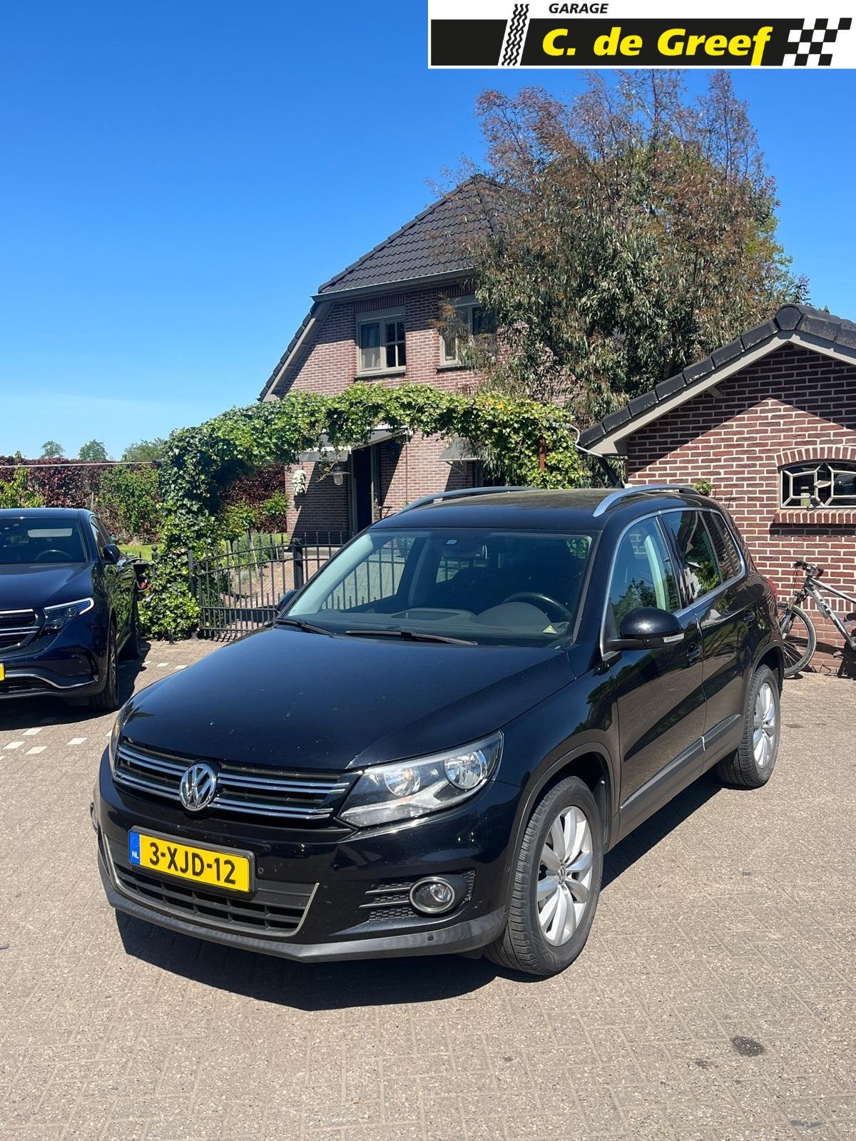 Volkswagen Tiguan 1.4 TSI Sport&Style, Voorwielaandrijving, Euro 5, Gebruikt, Zwart