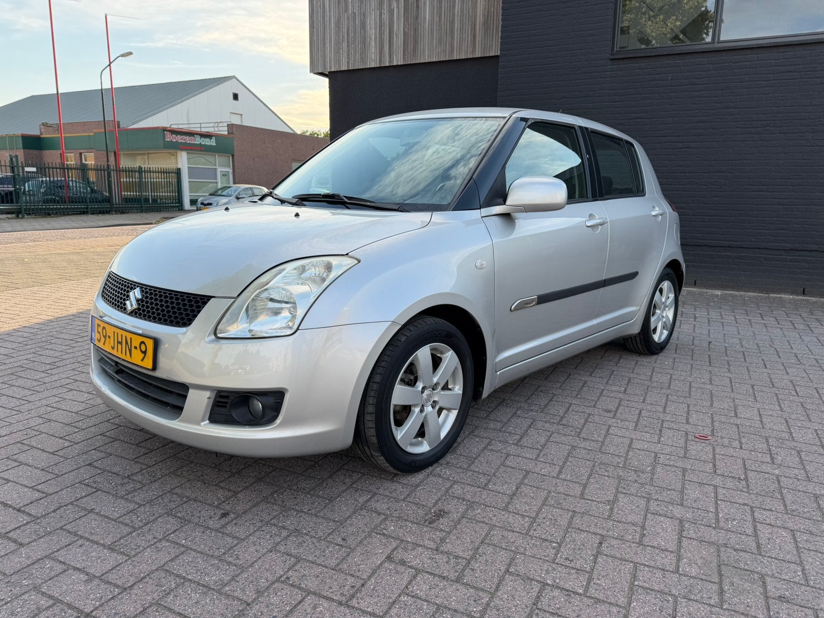 Suzuki Swift 1.3 5DRS 2009 Grijs, Voorwielaandrijving, Stof, 40 €/maand, Zwart