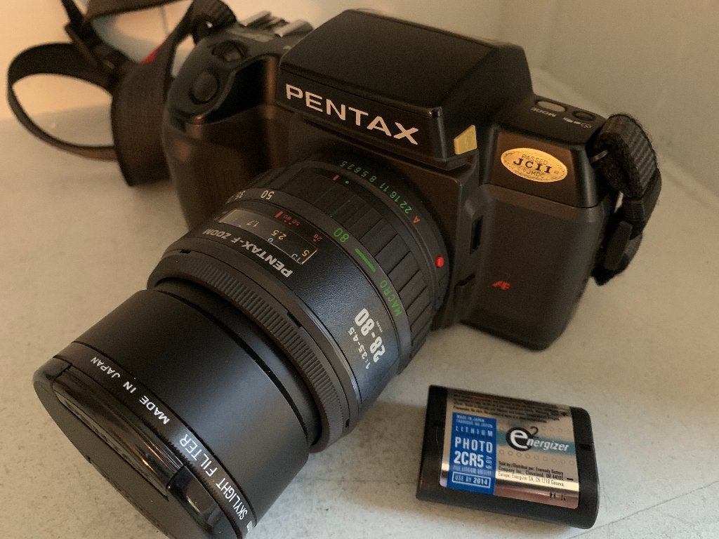 Pentax SF7 Spiegelreflexcamera met 28-80mm zoomlens, Audio, Tv en Foto, Fotocamera's Analoog, Ophalen of Verzenden, Zo goed als nieuw