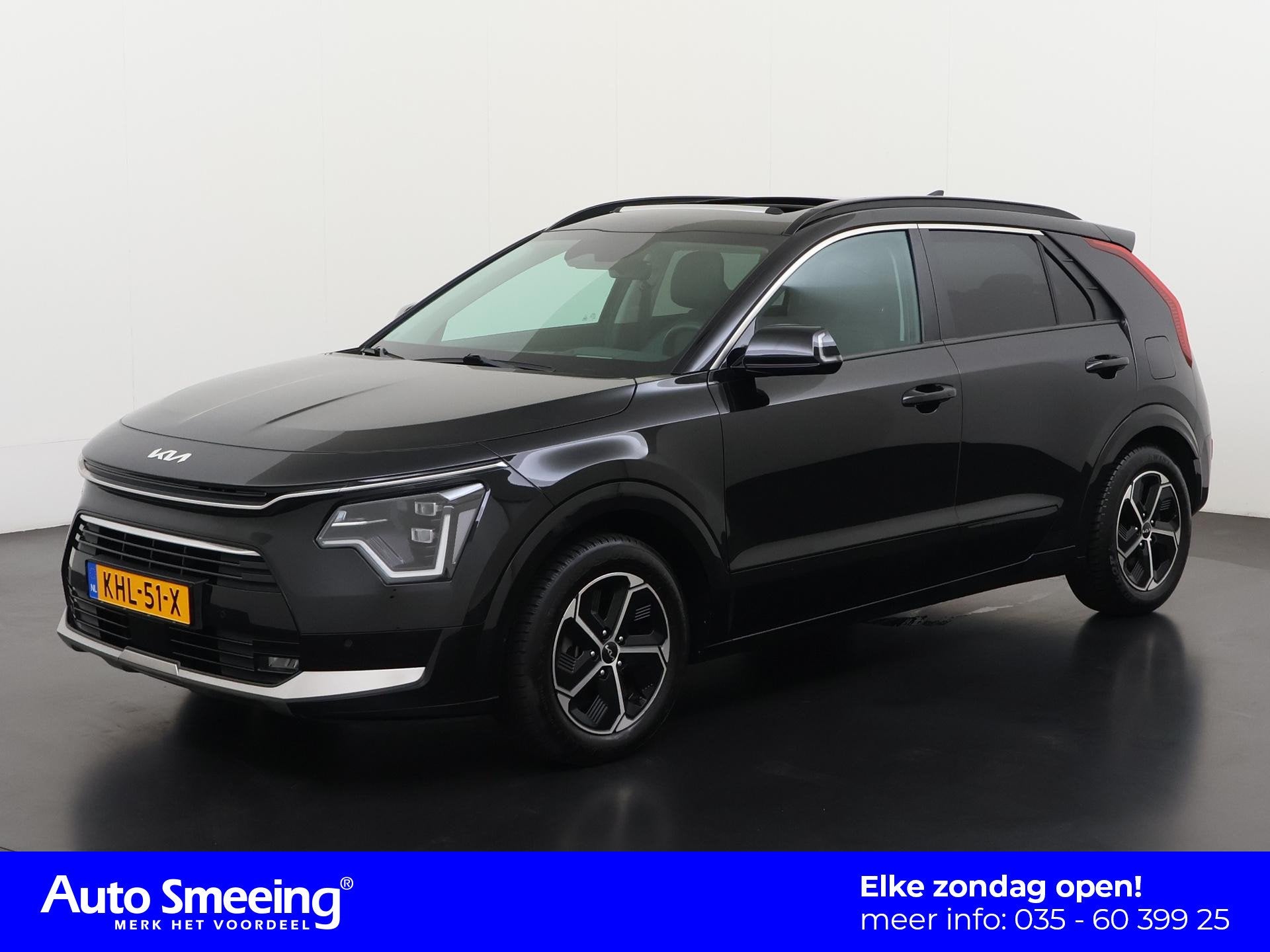 Kia Niro 1.6 GDi Hybrid DynamicLine | Schuifdak | Head-up |, Gebruikt, Euro 6, Leder en Stof, Zwart