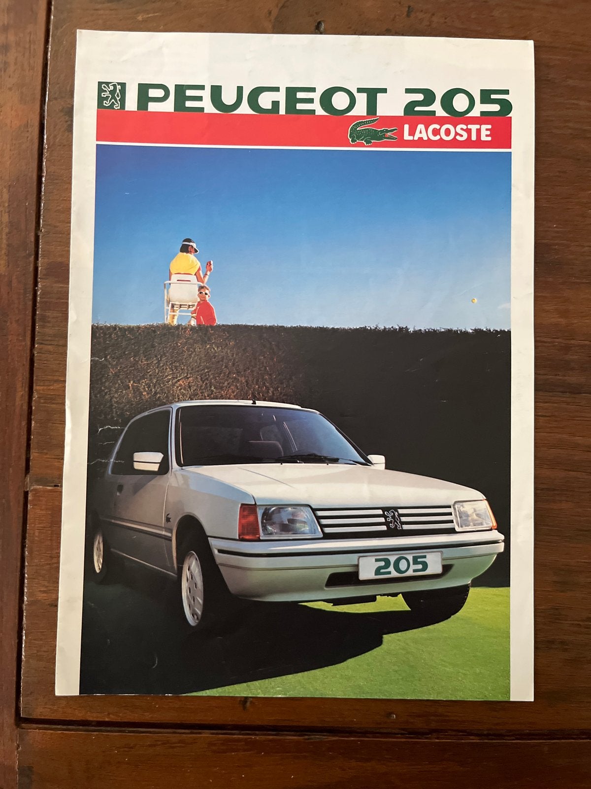 Peugeot 205 Lacoste uitklapbare folder (4 pagina's), Ophalen of Verzenden, Gelezen, Peugeot