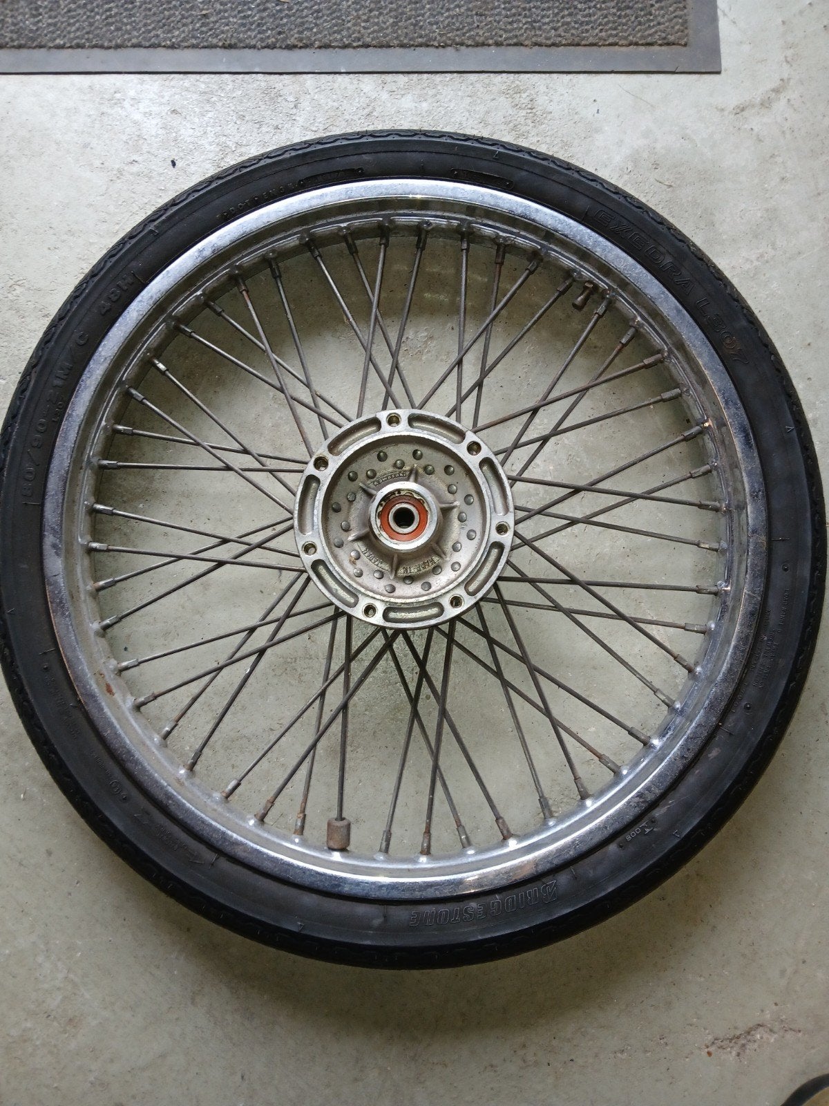 21 inch voorwiel van het merk kawasaki. as maat 15 mm, Motoren, Ophalen