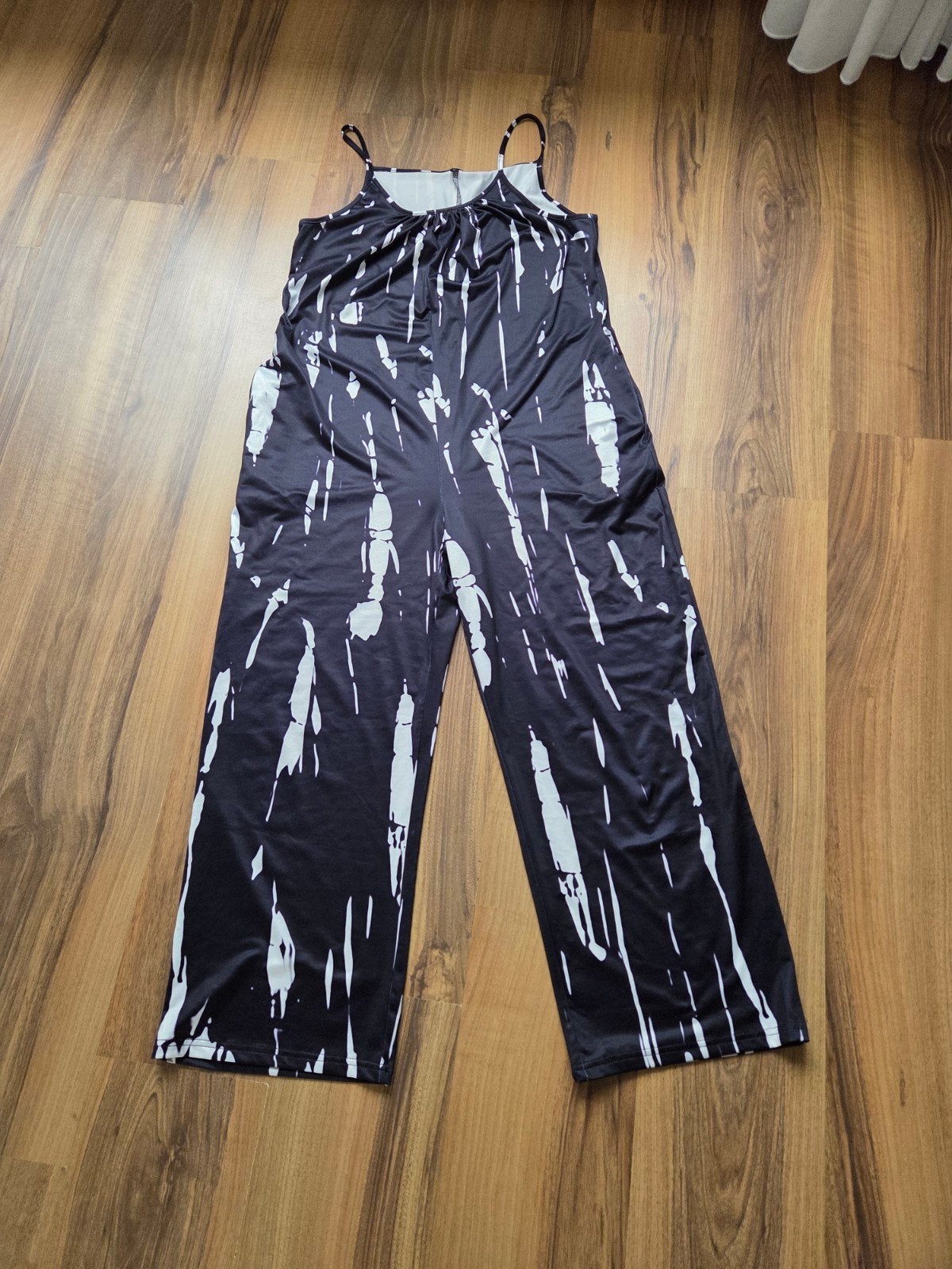 Zwarte jumpsuit met wit tie-dye patroon, maat L, Zwart, Maat 42/44 (L), Ophalen of Verzenden, Onbekend