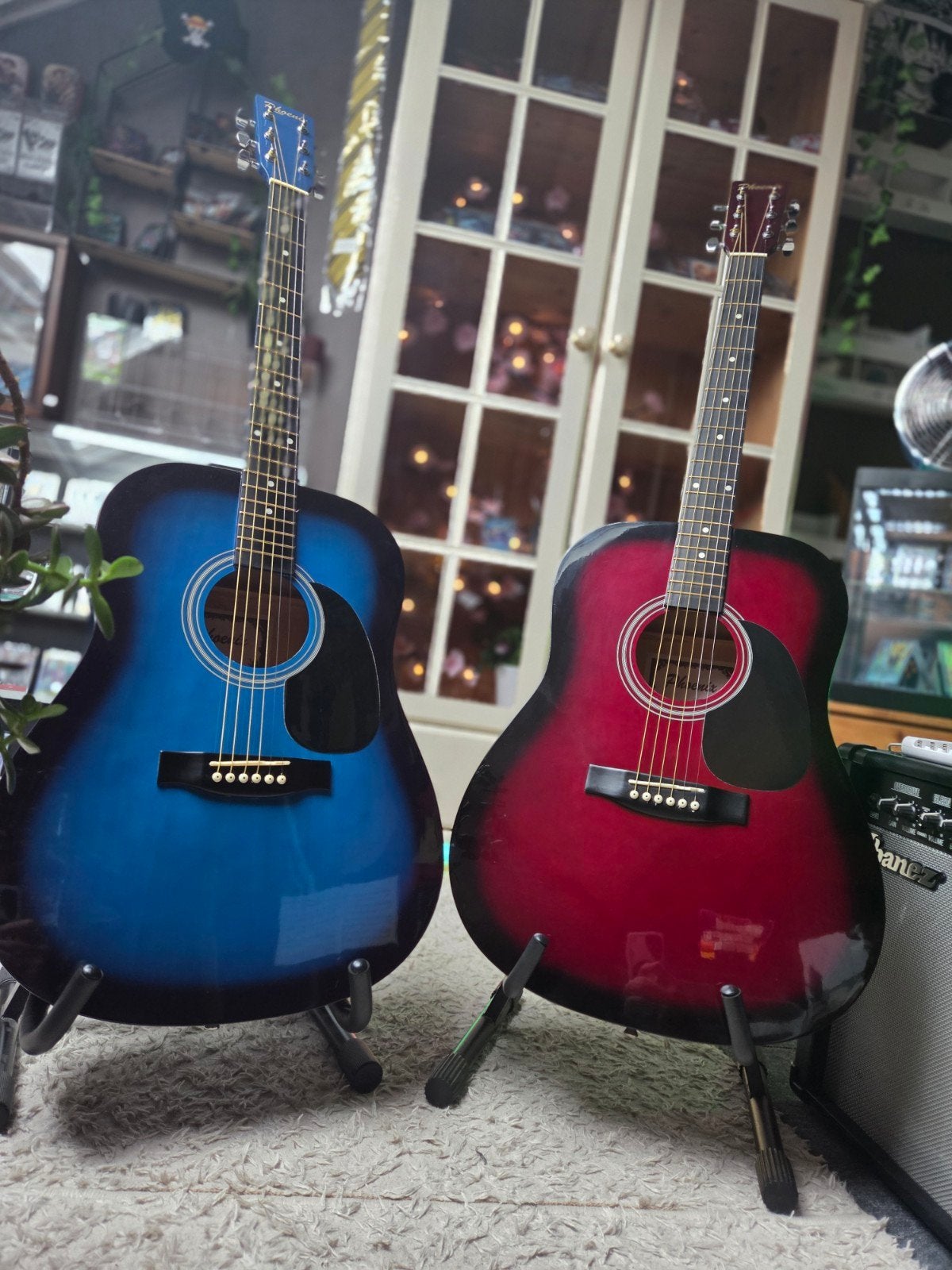 2x Phoenix akoestische gitaren, Ophalen