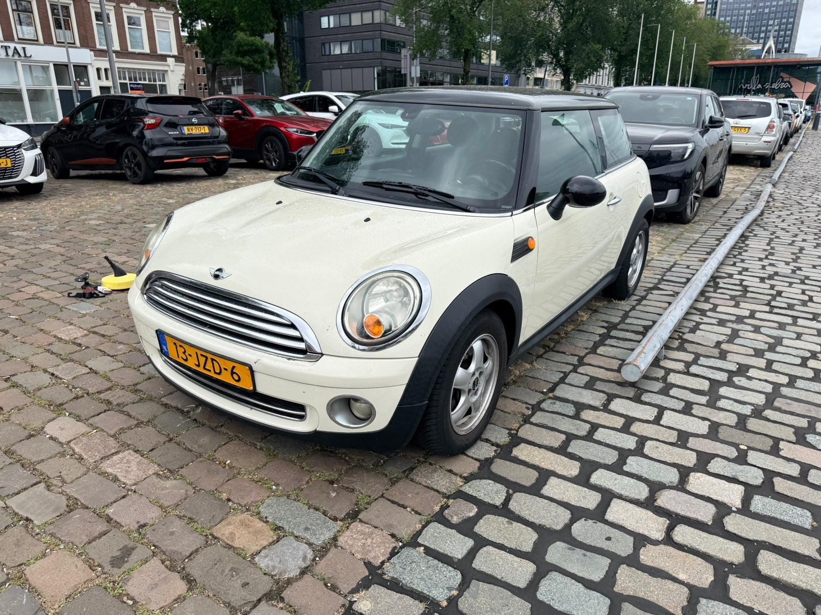 Mini 1.6 16V Cooper 2009 Wit, Auto's, Mini, Voorwielaandrijving, Stof, Zwart, 4 cilinders