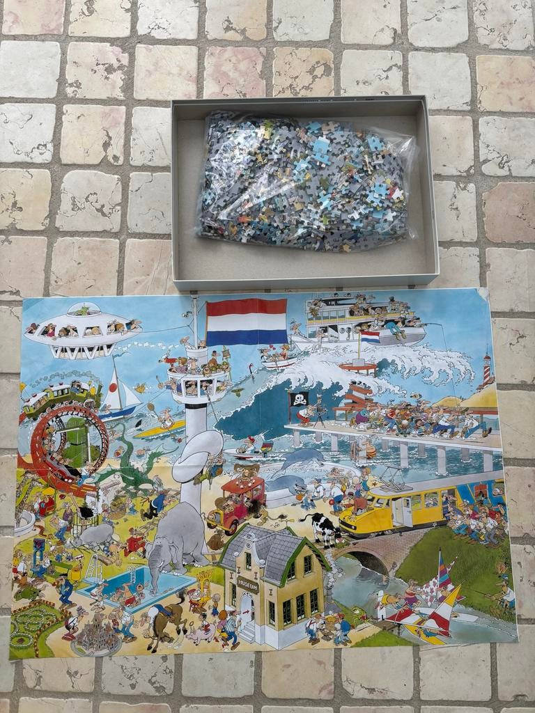 Jan van Haasteren legpuzzel 1000 st Ter land ter zee lucht!, Ophalen of Verzenden, 500 t/m 1500 stukjes, Gebruikt, Legpuzzel