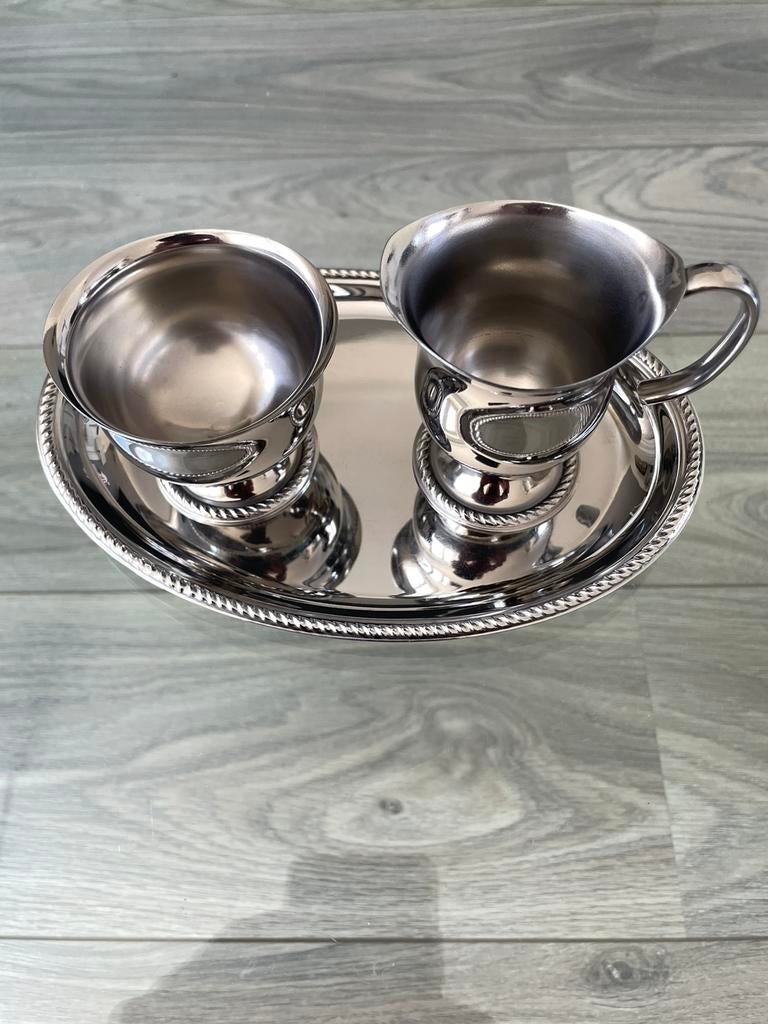 Alessi melk en suikerstel op dienblaadje., Zilver, Ophalen of Verzenden, Alessi, Overige typen