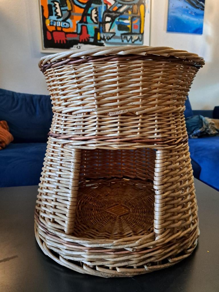 Rattan kattenmand, Ophalen