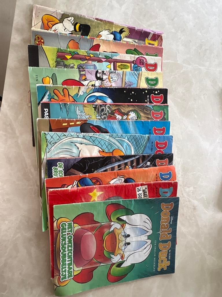 12 Donald Duck weekbladen - Diverse jaargangen, Meerdere stripboeken, Ophalen of Verzenden, Gelezen