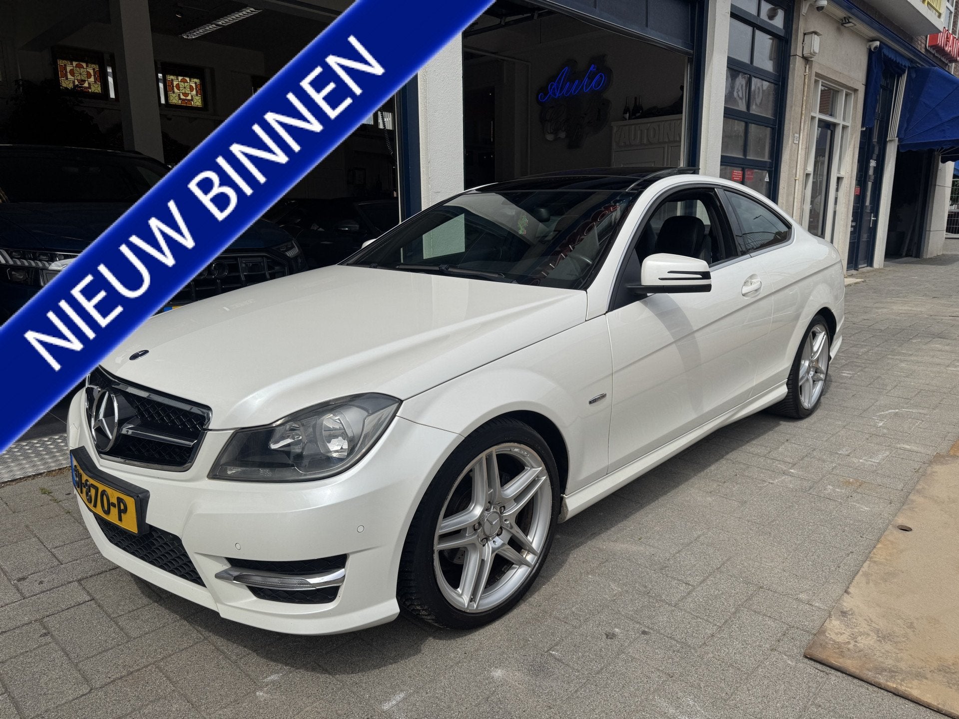 Mercedes-Benz C-Klasse Coupé 180 Ambition AMG/PANORAMA/LEDE, Euro 5, Achterwielaandrijving, Zwart, 4 stoelen