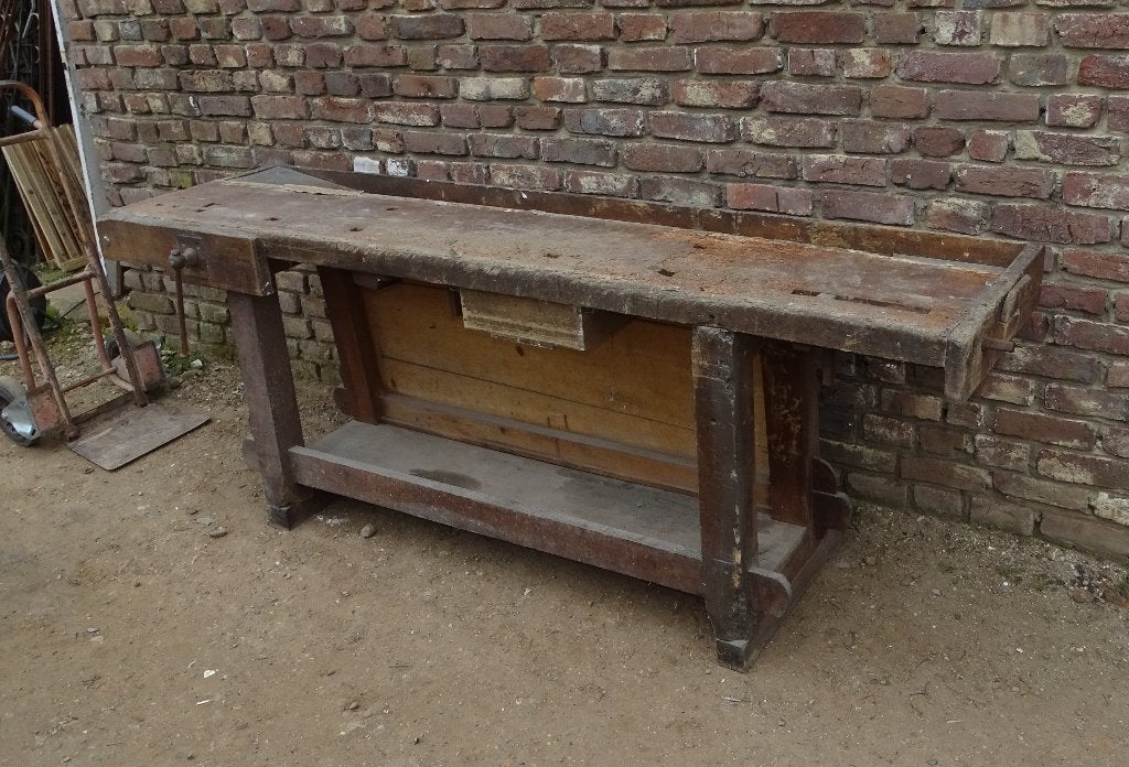 oude houten werkbank sitetabel met bankschroef, Ophalen