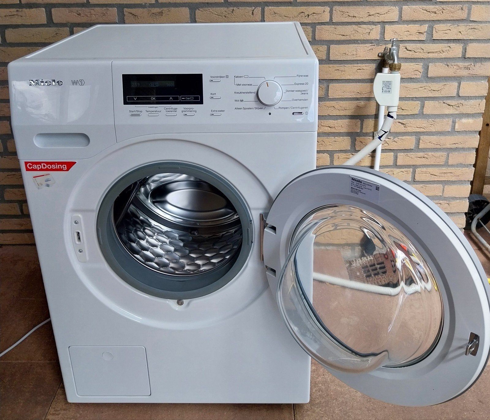 Miele WKB130 WPS Wasmachine 8kg 1600 toeren, Ophalen, Zo goed als nieuw, Voorlader, Energieklasse A of zuiniger