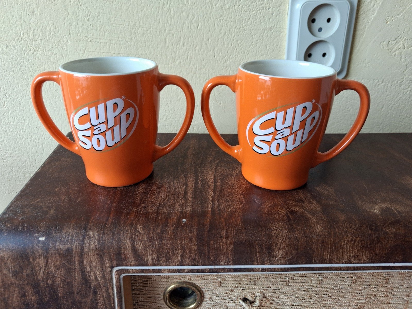 2 oranje cup a soup mokken met 2 oren., Ophalen of Verzenden, Zo goed als nieuw, Overige stijlen, Kop(pen) en/of Schotel(s)