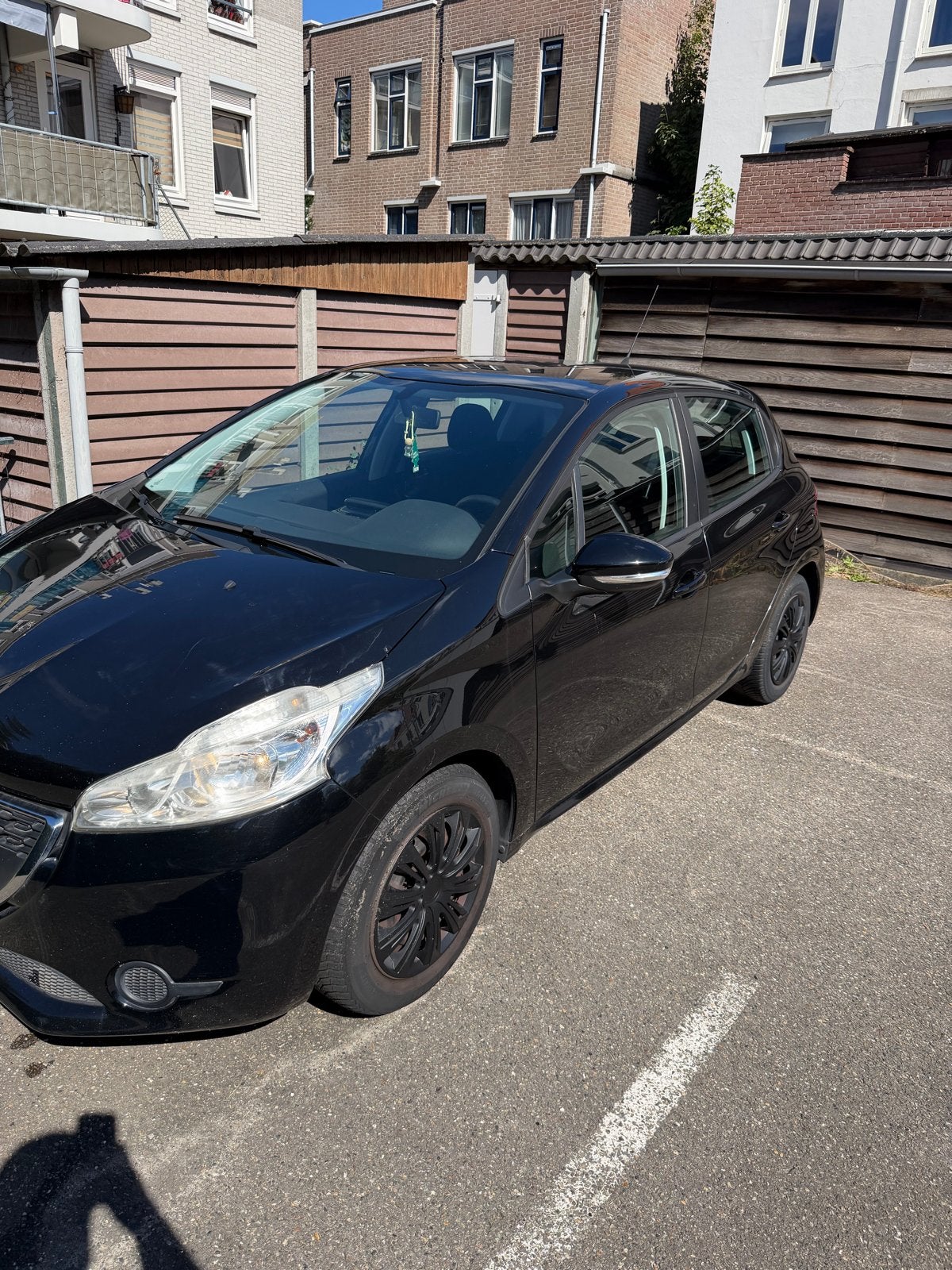 Peugeot 208 1.2 VTI 60KW/82PK 5-D 2014 Zwart, Voorwielaandrijving, 1199 cc, Zwart, Origineel Nederlands