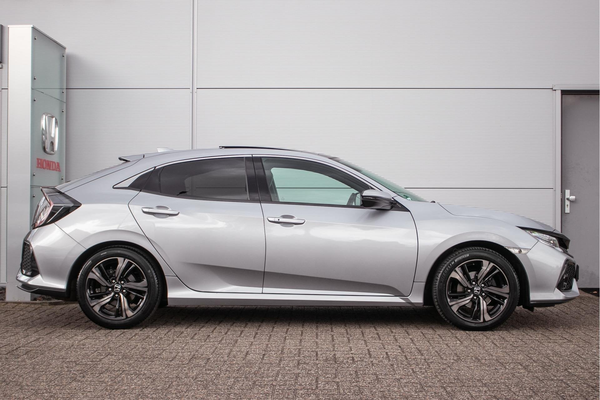 Honda Civic 1.0 i-VTEC Premium - Leer | Schuif/kanteldak | A, Auto's, Voorwielaandrijving, Stof, Gebruikt, 1246 kg