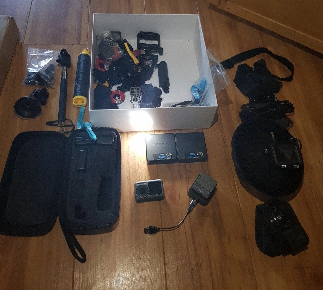 DJI Osmo Action (AC001) camera met uitgebreide accessoireset, Ophalen of Verzenden, Zo goed als nieuw, Overige merken
