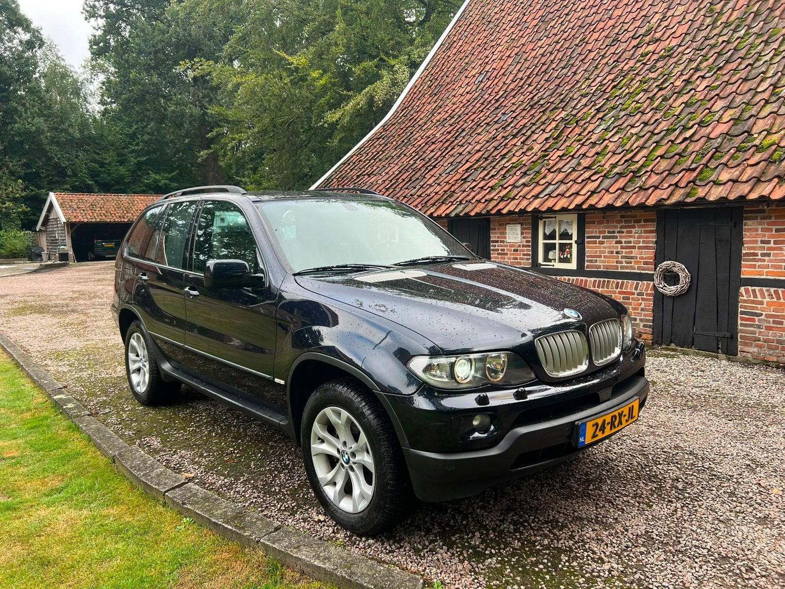 BMW X5 4.4 I AUT high exe m53 2005 Zwart, Auto's, 2095 kg, Automatische klimaatregeling, Zwart, Vierwielaandrijving