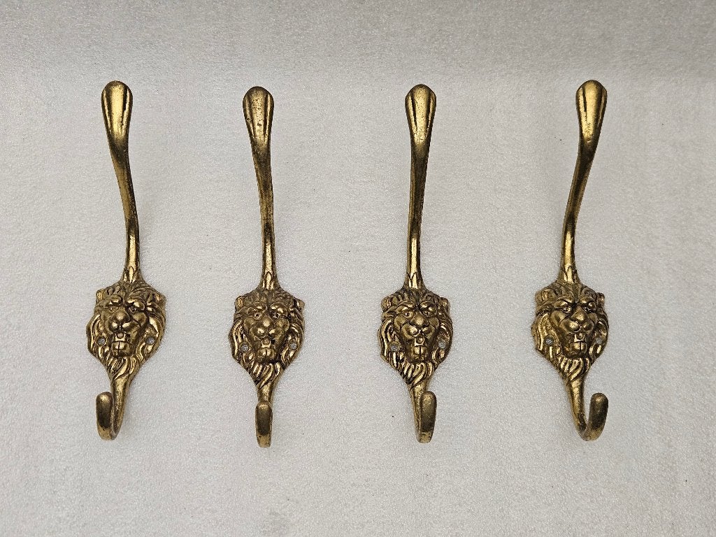 Setje Leeuwenkoppen Kapstokhaken 4x ( Set22 ), Ophalen of Verzenden, Metaal, Wandkapstok, Minder dan 100 cm