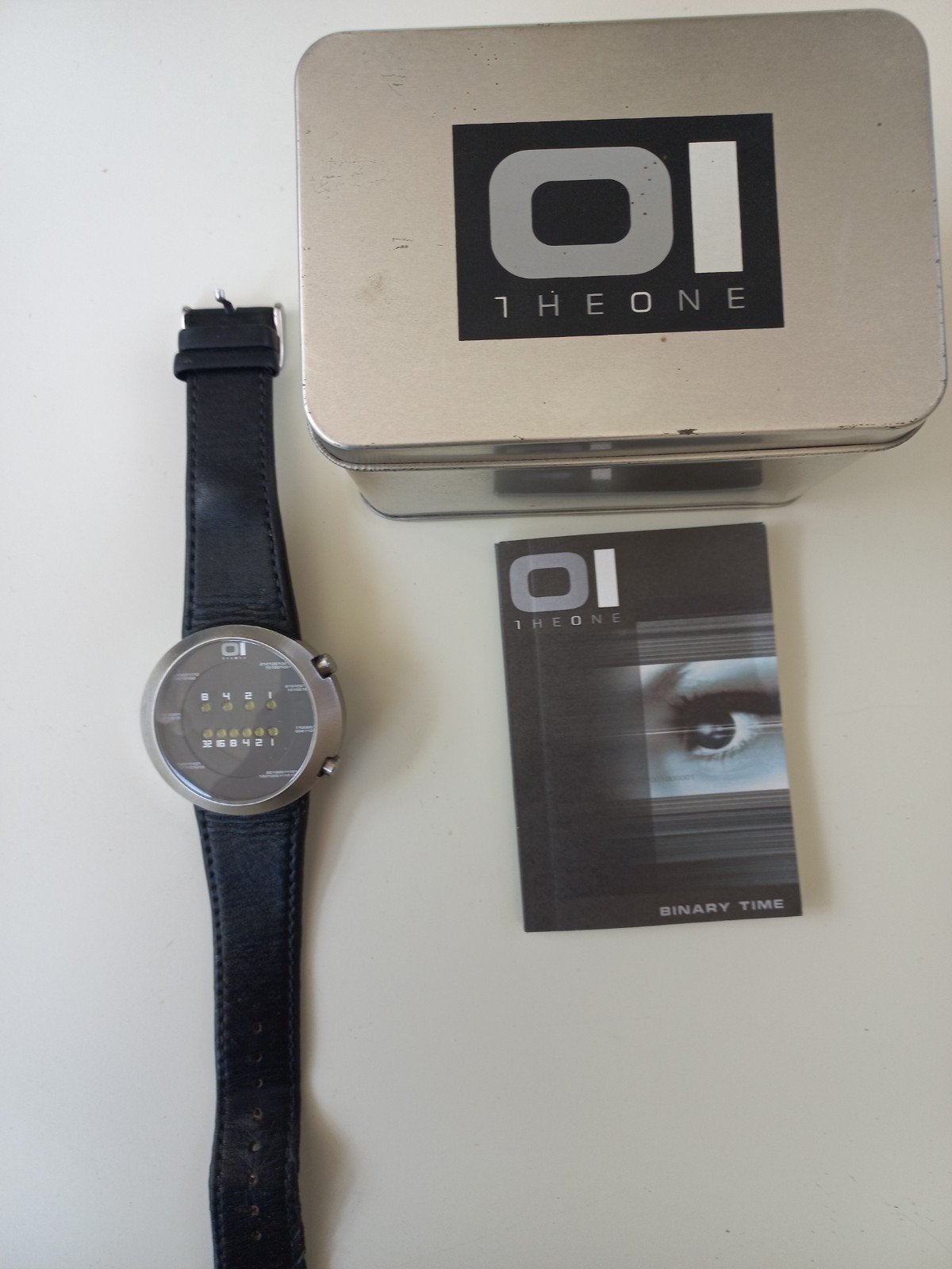 The One Binary Time Horloge - Zo goed als nieuw, Overige merken, Leer, Staal, Polshorloge