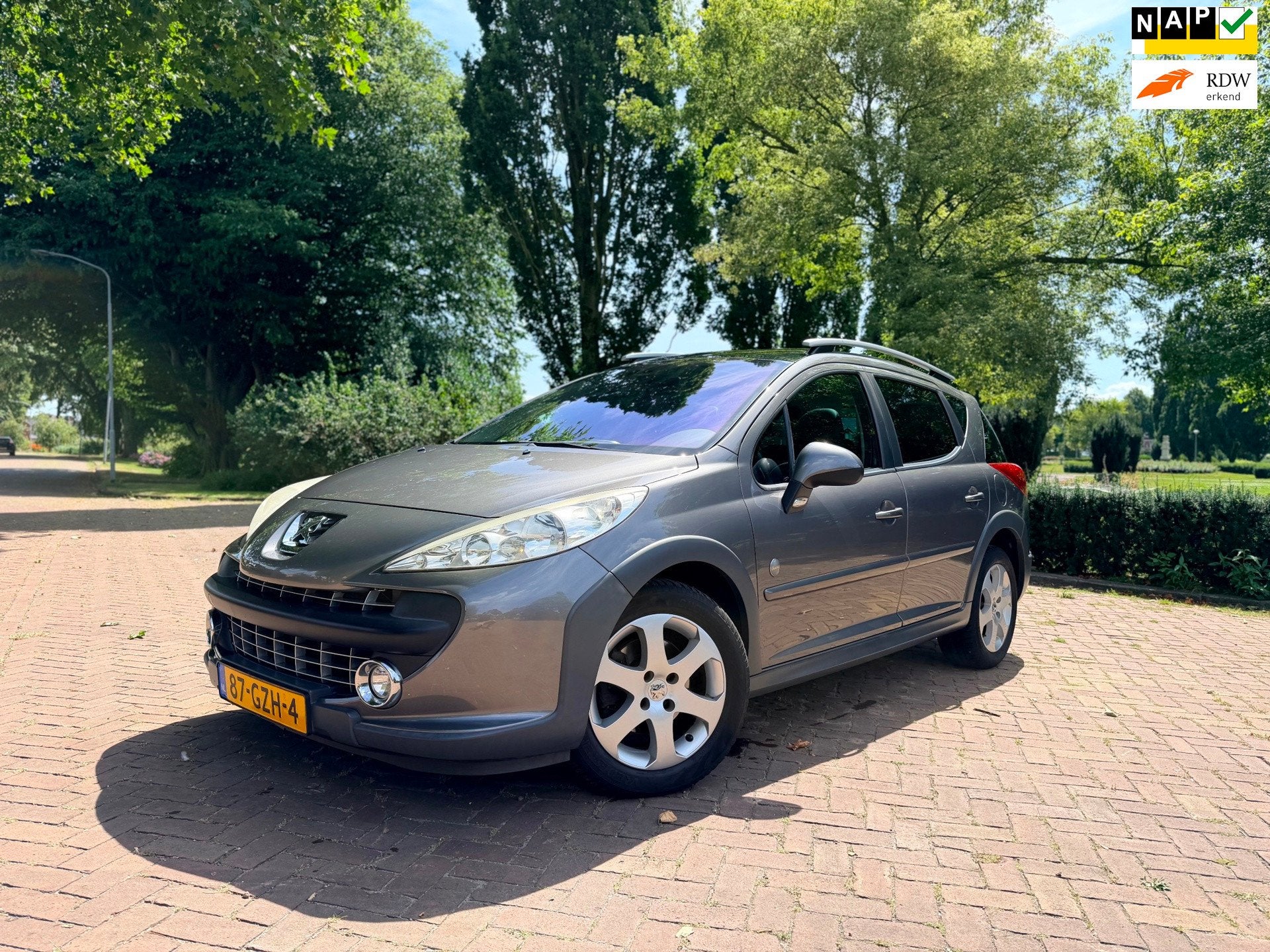Peugeot 207 SW Outdoor 1.6 VTi XS Outdoor | Pano | Cruise |, Auto's, Gebruikt, Zwart, 4 cilinders, 1110 kg