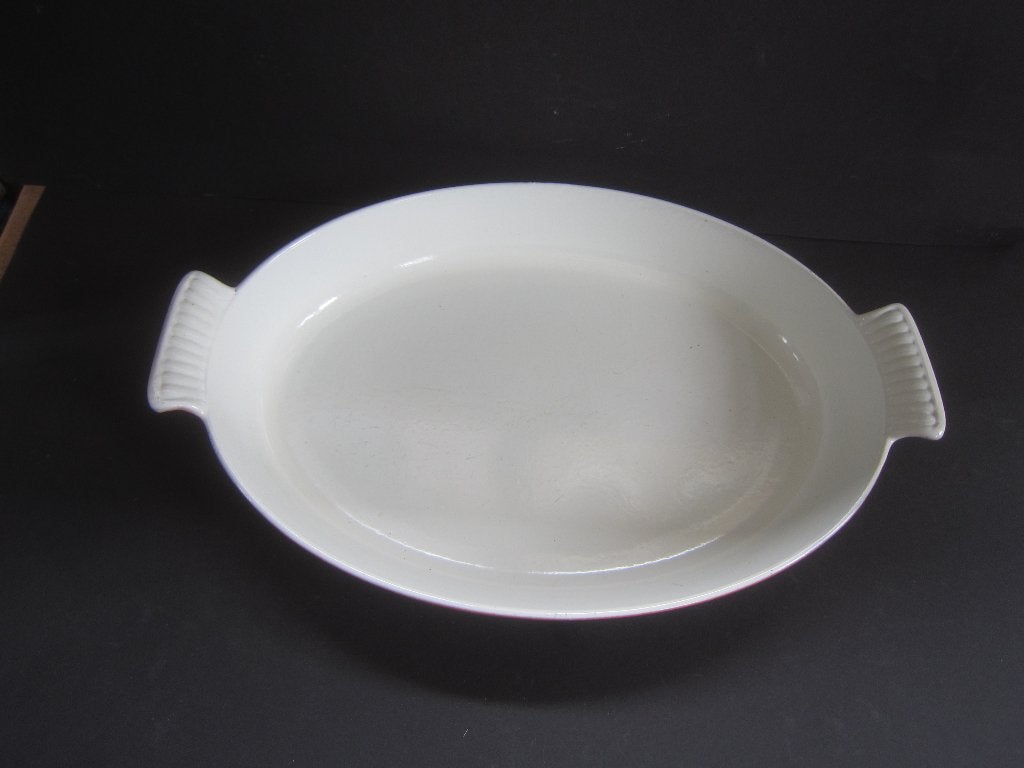 ovenschaal gietijzeren 40 cm. in keurige conditie oranje, Huis en Inrichting, Overige typen, Ophalen of Verzenden, Zo goed als nieuw