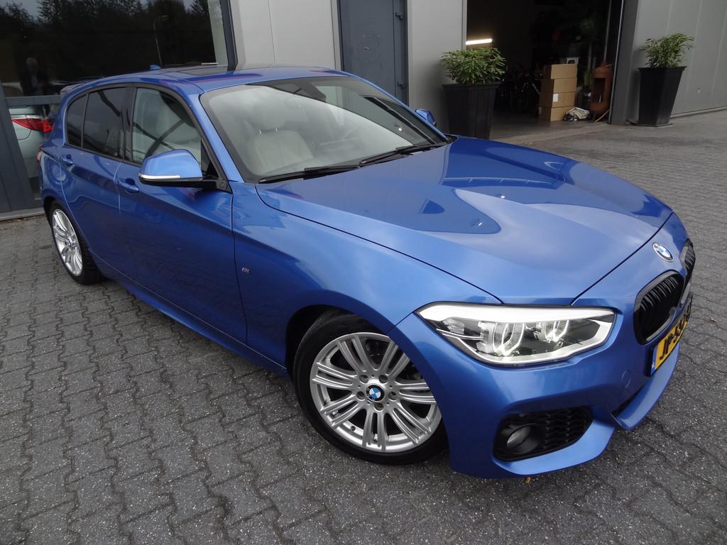 BMW 1-serie 116d Centennial High Executive 2X M-SPORT | NL-A, Gebruikt, Blauw, 116 pk, Bedrijf