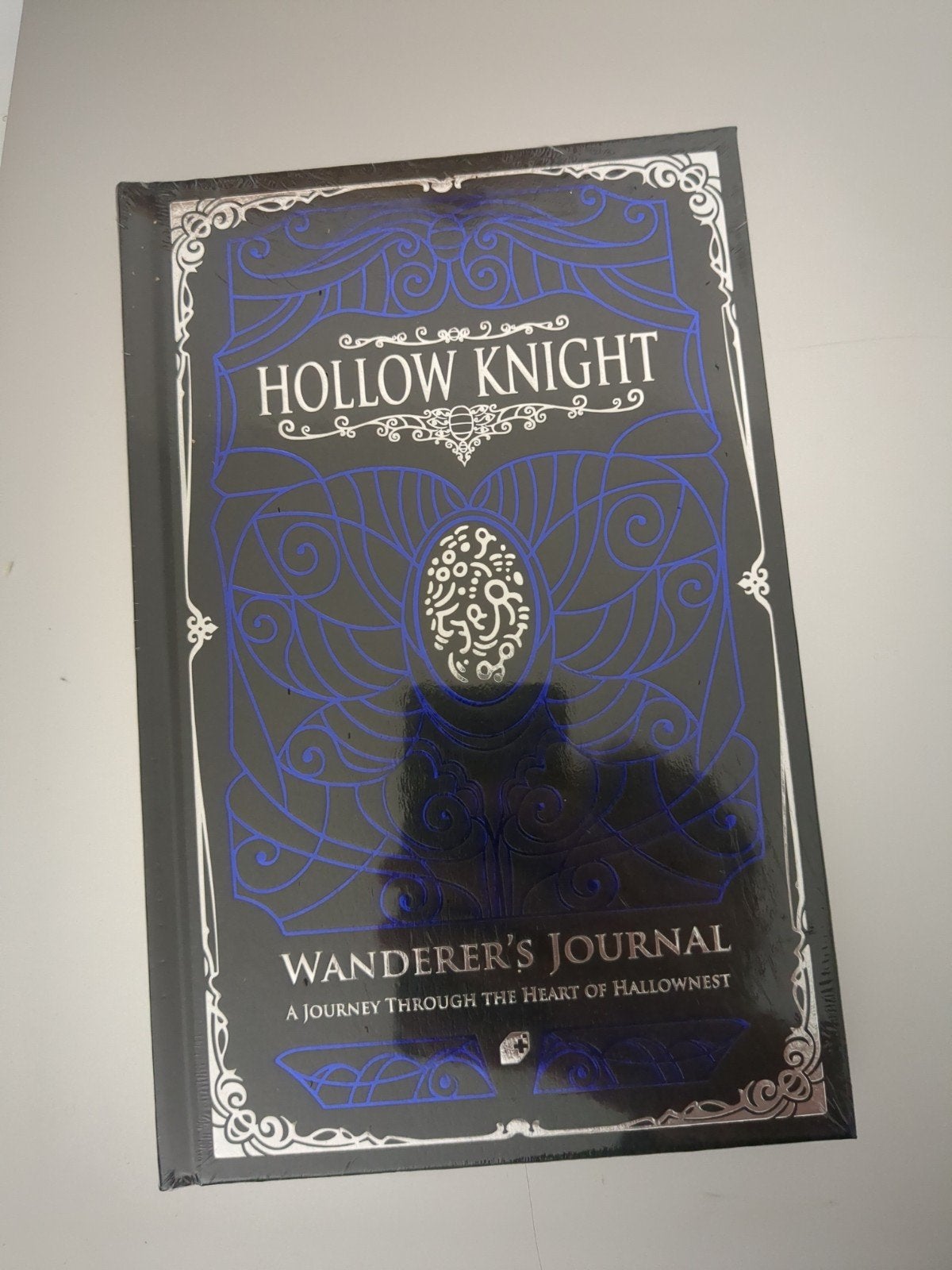 Hollow Knight Wanderer's Journal - Nieuw in folie, Boeken, Ophalen of Verzenden, Nieuw, Ari Gibson, William Pellen, David Kazi