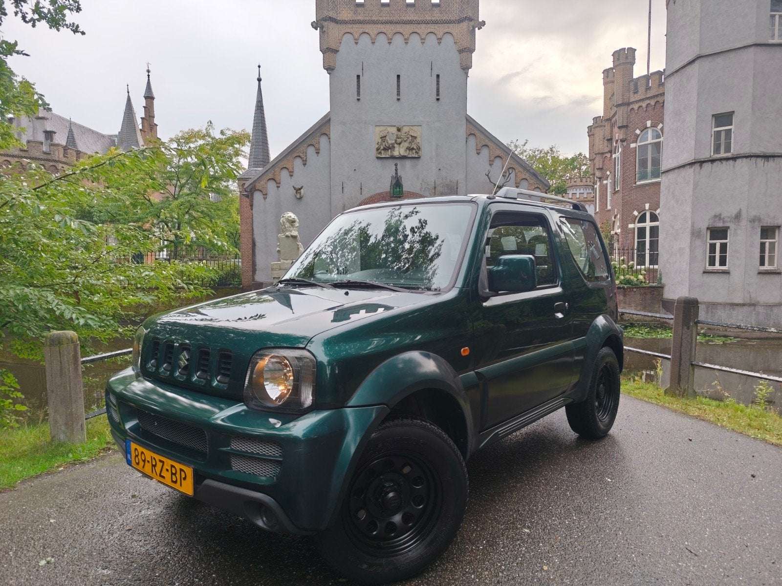 Suzuki Jimny 1.3 4WD GROEN / 104.000 km / apk 8-2027 / NAP!!, Stof, 40 €/maand, Zwart, 4 stoelen