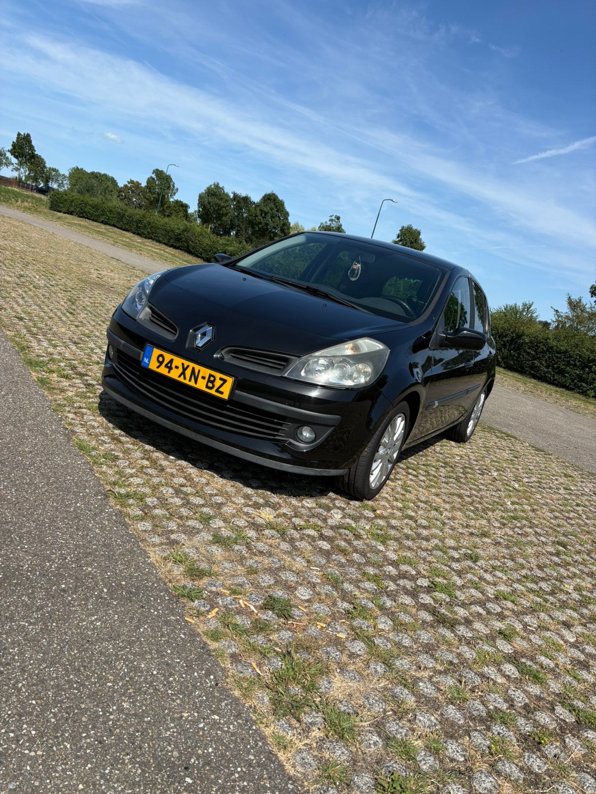 Renault Clio 1.6 16V 82KW 5-DRS 2007 Zwart, Auto's, Voorwielaandrijving, 4 cilinders, Zwart, Origineel Nederlands
