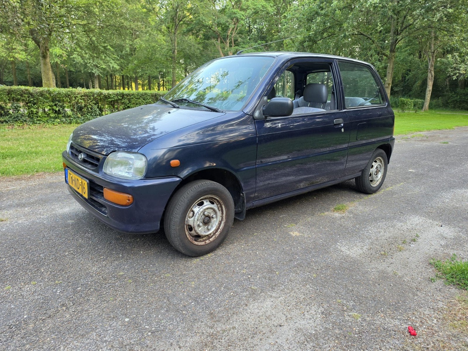 Daihatsu Cuore 0.8 1998 automaat 102.547 NAP, Auto's, Daihatsu, Stof, Blauw, Cuore, 400 kg