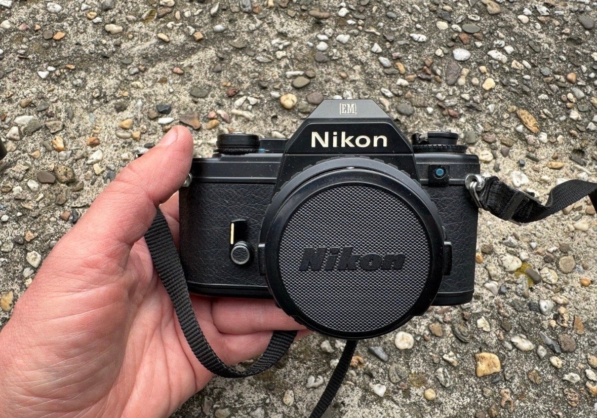 Nikon EM Spiegelreflexcamera met 50mm 1:1.8 lens, Ophalen of Verzenden, Gebruikt, Spiegelreflex, Nikon