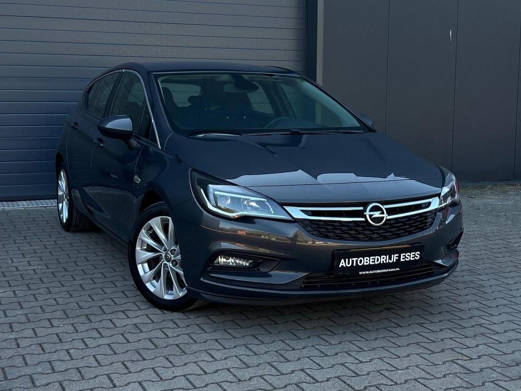 Opel Astra 1.0 Turbo Business+ |CARPLAY|CRUISE|MF-STUUR|AC, Auto's, Stof, Gebruikt, Euro 6, Met garantie (alle)