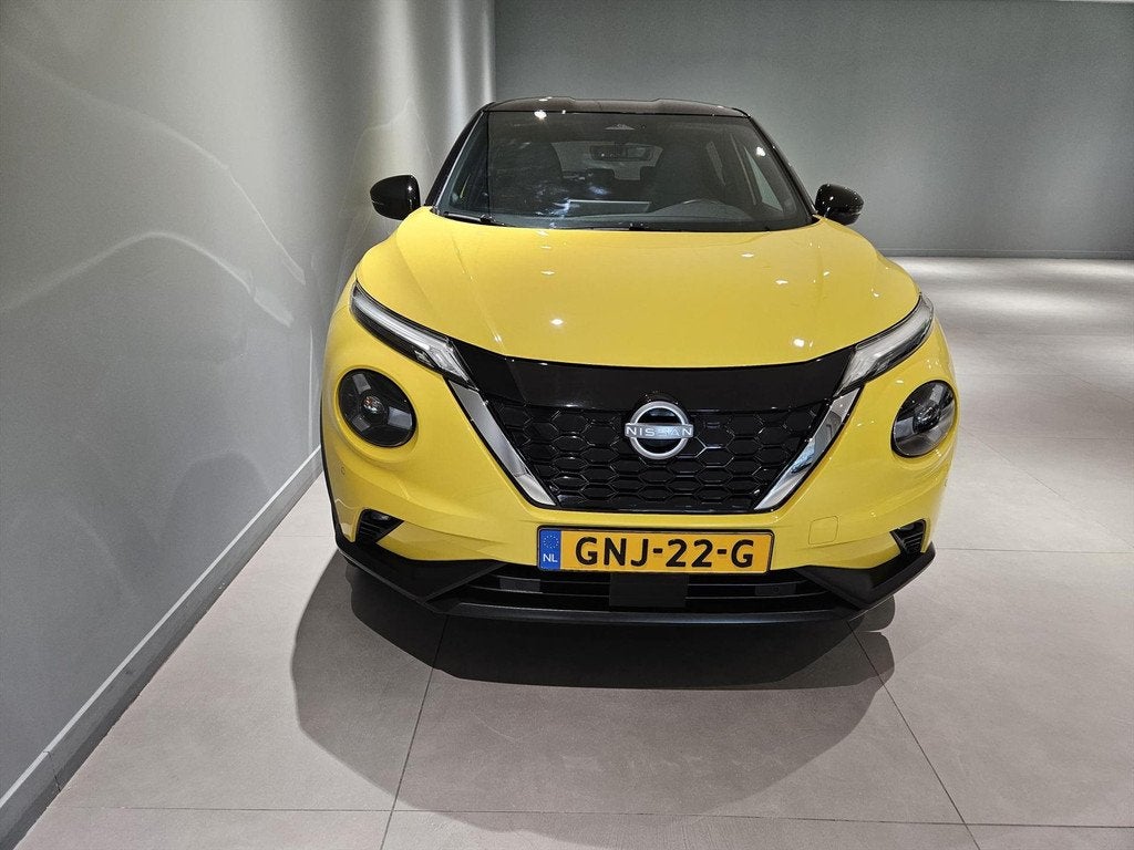 NISSAN Juke Hybrid 143pk Business Premium Navi/ Clima/ Cruis, Auto's, Stof, Gebruikt, 4 cilinders, Bedrijf