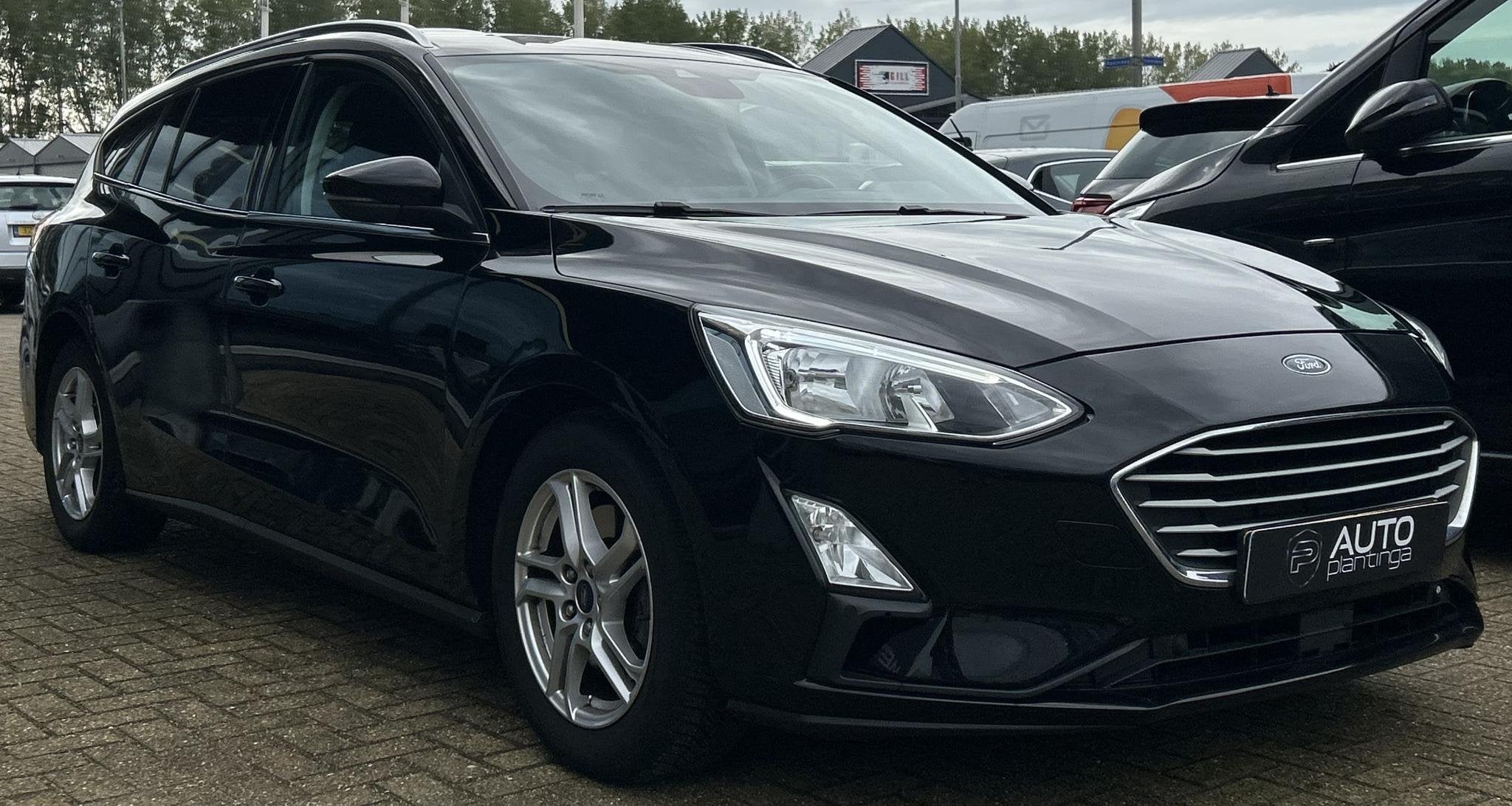 Ford Focus Wagon 1.0 EcoBoost Titanium Business 125PK | AUTO, Gebruikt, Euro 6, 715 kg, Zwart