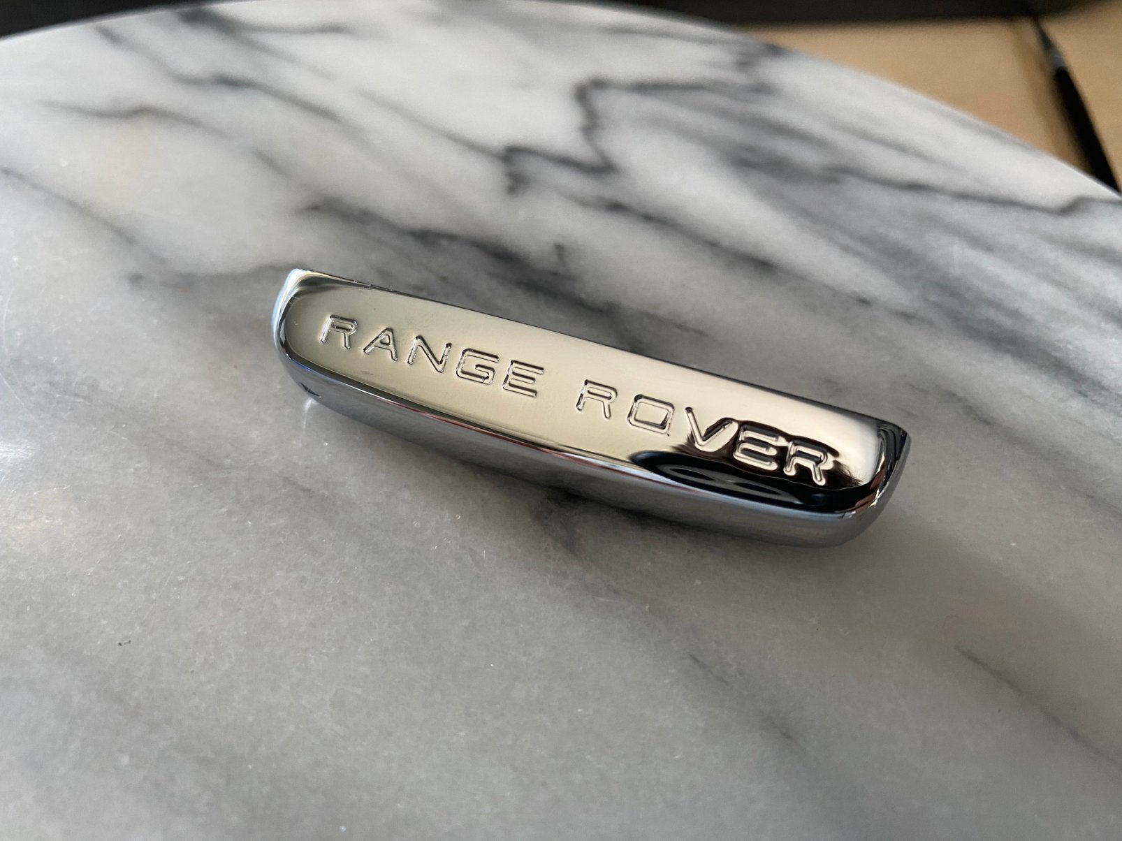 Range Rover sleutelchrome dopje 2010-2015, Ophalen of Verzenden, Zo goed als nieuw