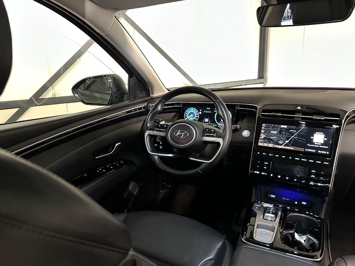 Hyundai Tucson 1.6 T-GDI HEV | Premium Sky | Pano | Leer | N, Auto's, Gebruikt, Euro 6, 4 cilinders, 179 pk