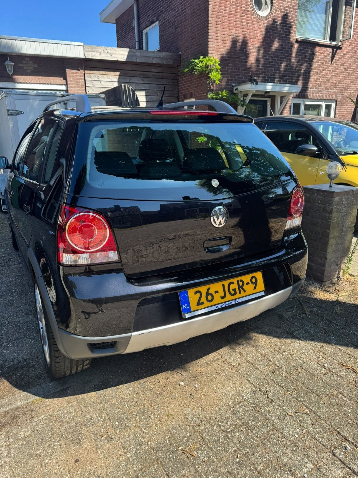 Volkswagen Polo 1.4 16V 59KW Cross 2009 Zwart, Voorwielaandrijving, 15 km/l, Zwart, Origineel Nederlands