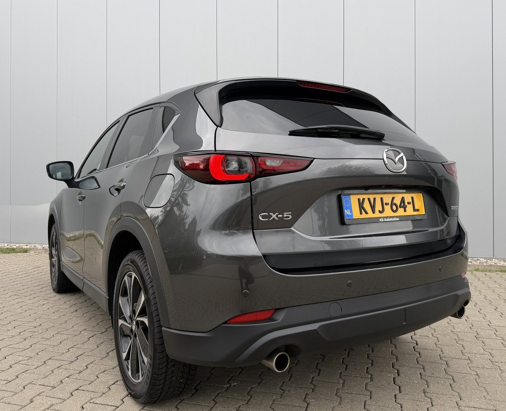 Mazda CX-5 2.0 SkyActiv-G 165 Advantage Automaat 2023, Auto's, Gebruikt, Euro 6, 4 cilinders, 2000 kg