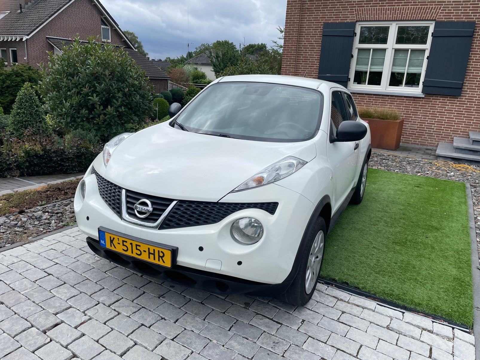 Nissan Juke 1.6 86KW Eco-pure Drive 2012 Wit, Auto's, Nissan, Voorwielaandrijving, Stof, 1250 kg, 4 cilinders