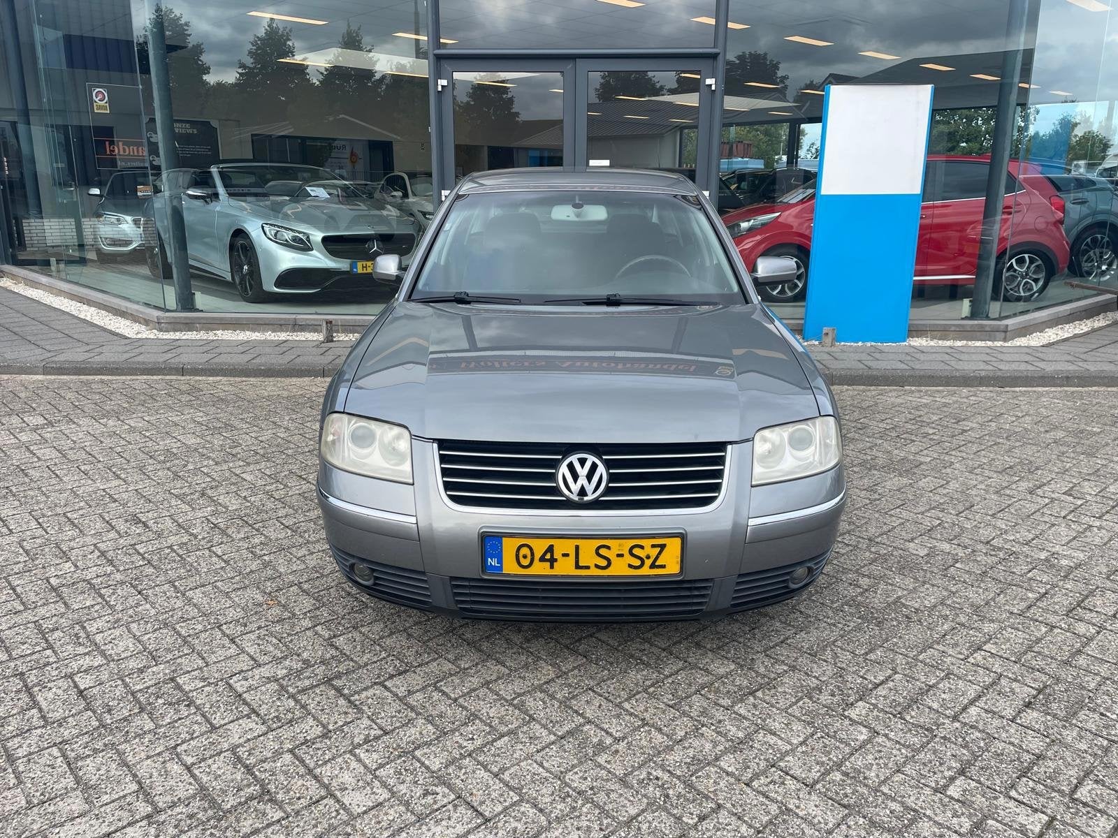 Volkswagen Passat 2.0-20V Arctic, Auto's, Dealer onderhouden, 1325 kg, Gebruikt, Zwart