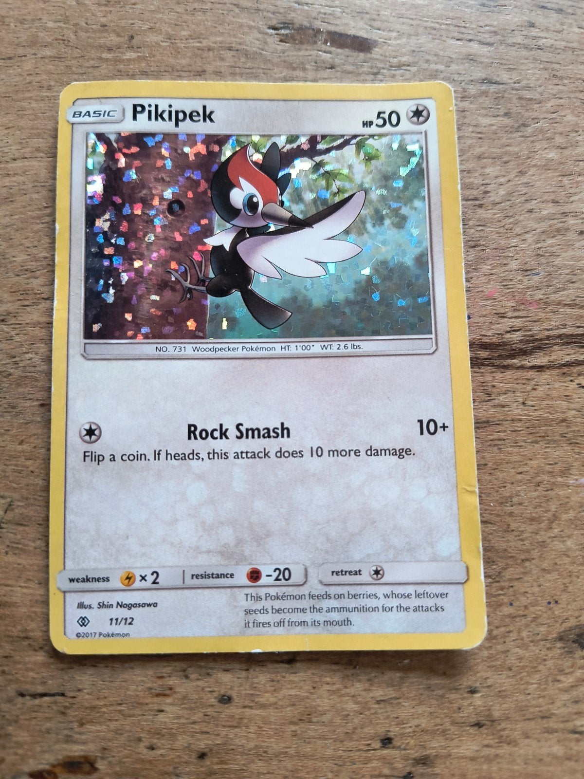 Pikipek 11/12 - Pokémon Kaart - Basic - HP50 - Foil, Ophalen of Verzenden, Zo goed als nieuw, Losse kaart, Foil