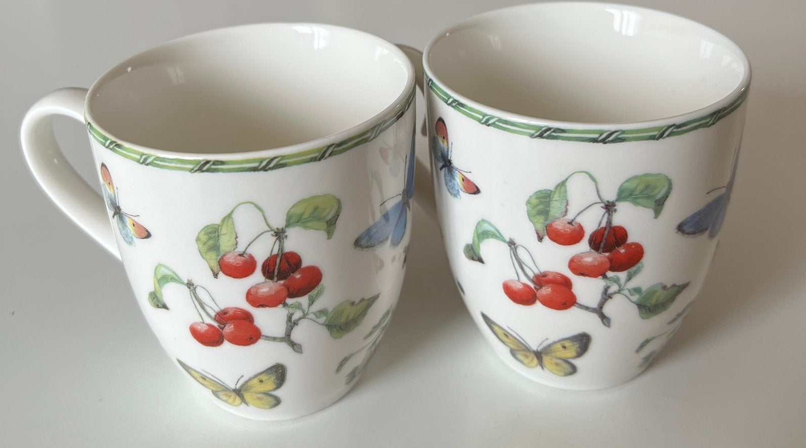2 porseleinen mokken Janneke Brinkman Fruit & Flowers, Ophalen of Verzenden, Zo goed als nieuw, Overige stijlen, Kop(pen) en/of Schotel(s)