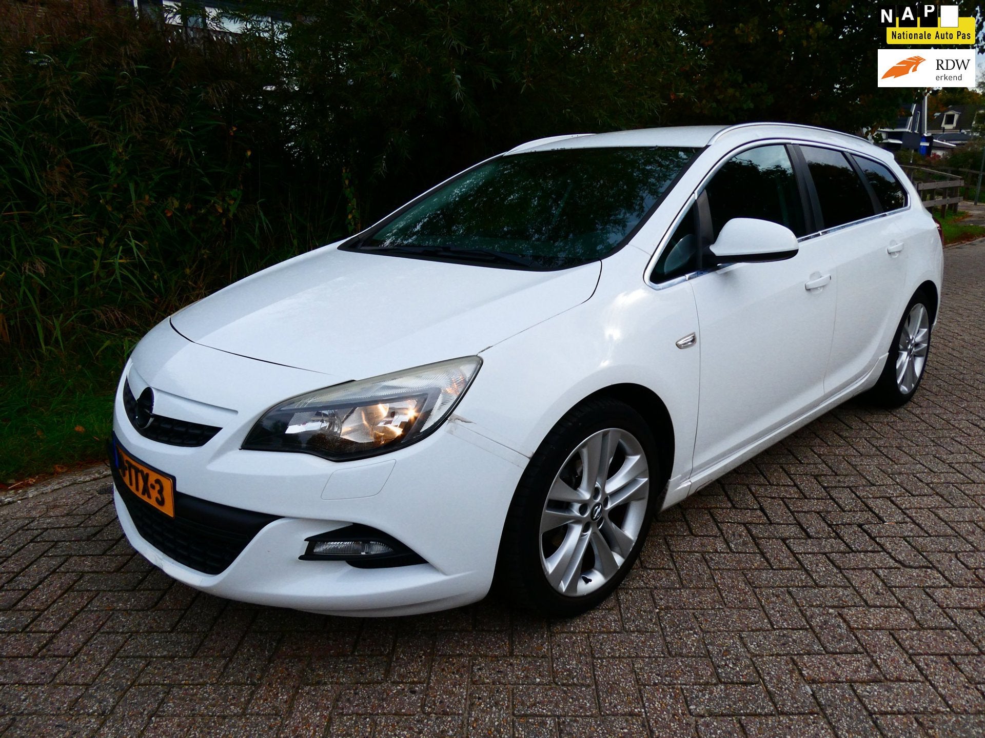 Opel Astra Sports Tourer 1.4 Turbo Sport Clima Navi KIJK FOT, Voorwielaandrijving, Euro 5, Stof, Gebruikt