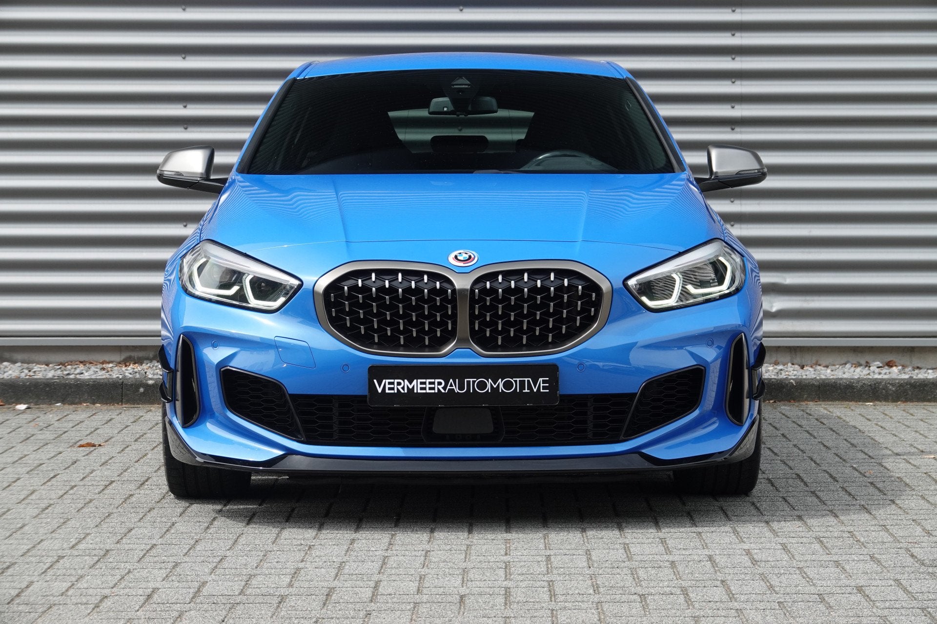 BMW 1-serie M135i xDrive High Executive | M Performance | HU, Auto's, Gebruikt, 4 cilinders, Blauw, Alcantara