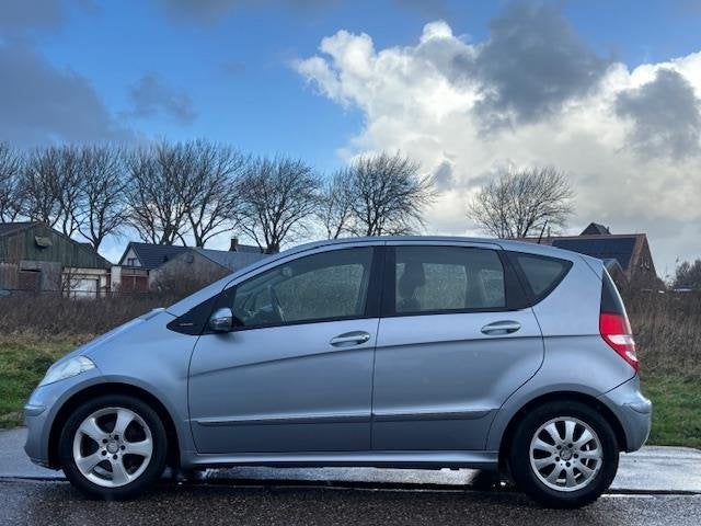 Mercedes-Benz A-klasse 150 Elegance 5-Drs Airco El. pakket A, Auto's, Voorwielaandrijving, Dealer onderhouden, Stof, Zwart