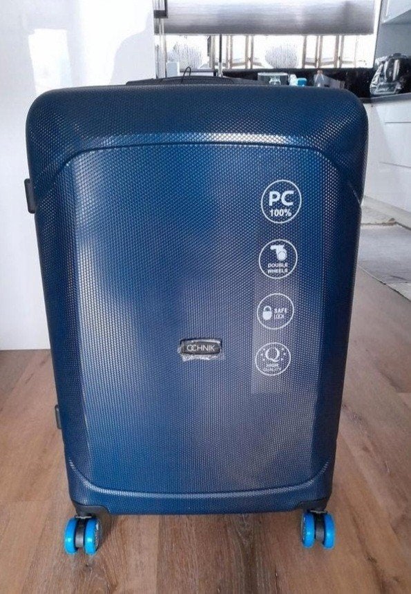 Nieuwe Ochnik 28 inch polycarbonaat koffer met hoes, Sieraden, Tassen en Uiterlijk, Koffers, Ophalen of Verzenden