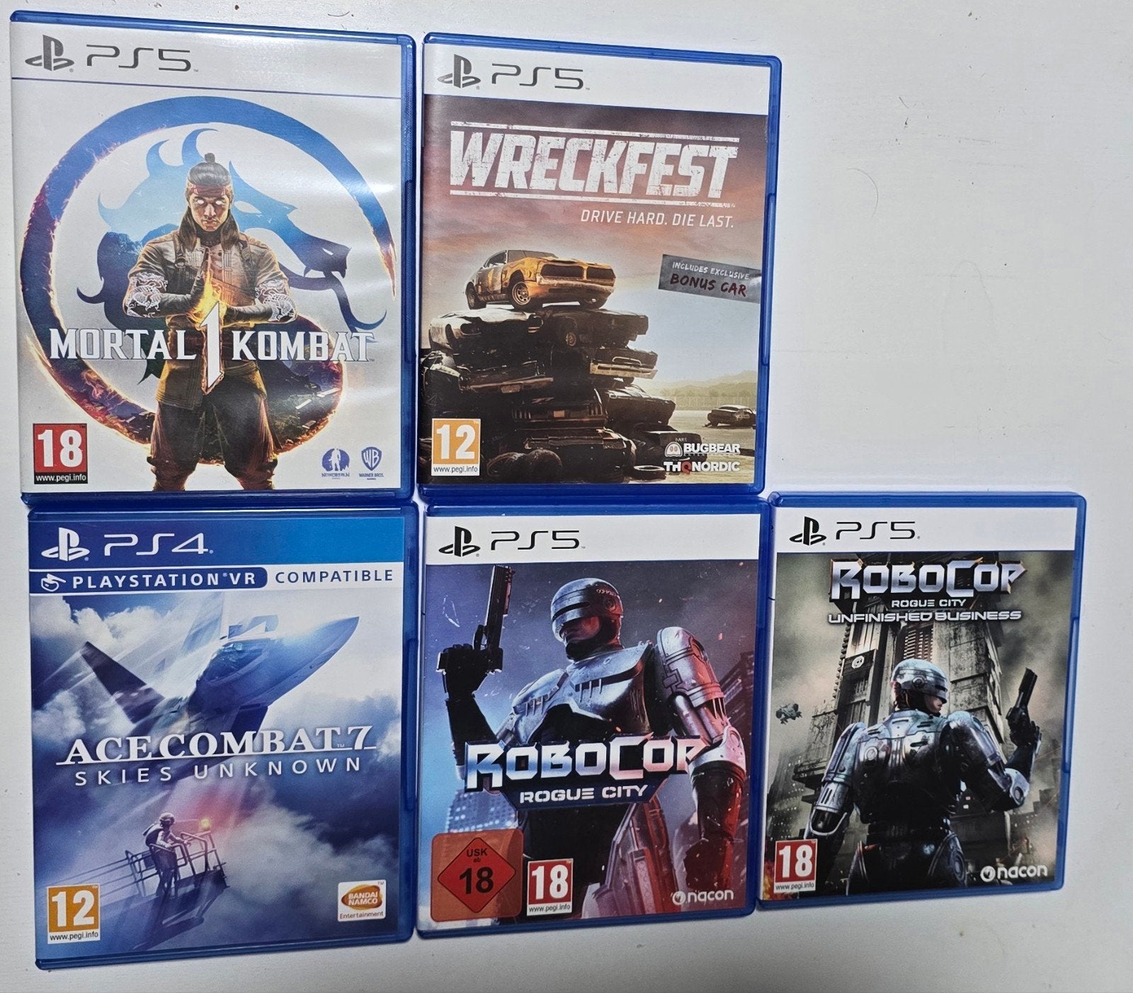PS5 and PS4 games (RoboCop, Ace Combat, Wreckfest, Mortal K), Spelcomputers en Games, Ophalen, Zo goed als nieuw, Avontuur en Actie