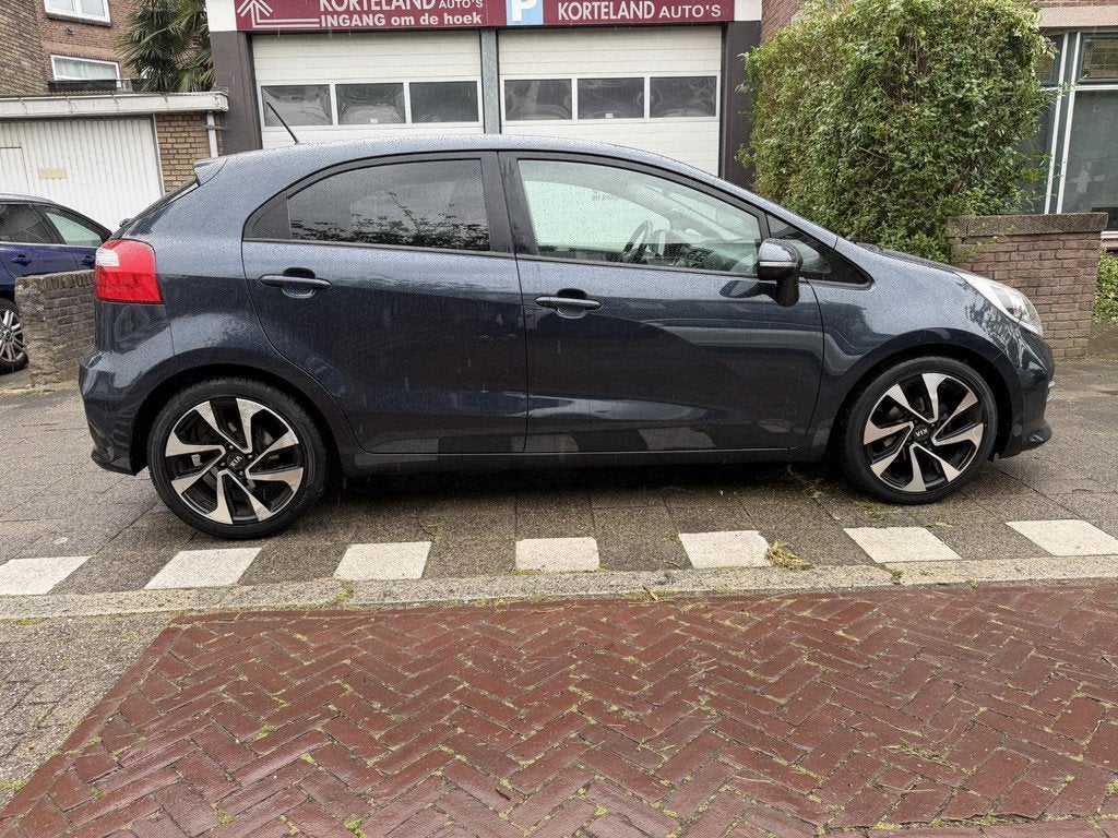 Kia Rio 1.2 CVVT ExecutiveLine NAVI CAMERA NIEUWE KOPPELING, 1027 kg, 4 cilinders, Met garantie (alle), Blauw